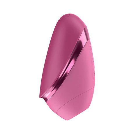 Womanizer Next Liberty Air Clitoral Massager Vibrant Pink side view on a white background.