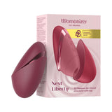 Womanizer Next Liberty Air Clitoral Massager Bordeaux with packaging showcasing 3D Pleasure Air Technology.