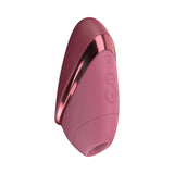 Womanizer Next Liberty Air Clitoral Massager Bordeaux in sleek design with control buttons for customizable pleasure.
