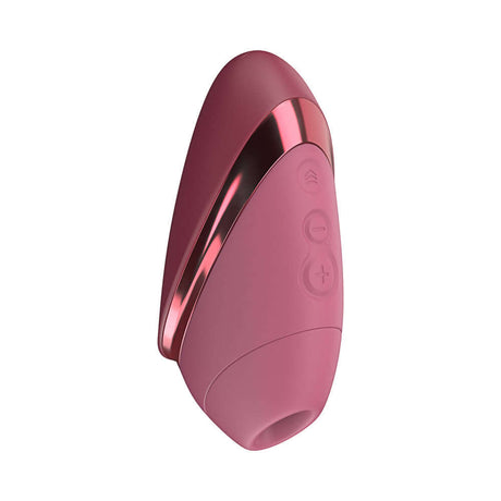 Womanizer Next Liberty Air Clitoral Massager Bordeaux in sleek design with control buttons for customizable pleasure.
