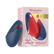 Womanizer Next Liberty Air Clitoral Stimulator Blue Red with packaging showcasing 3D Pleasure Air technology.