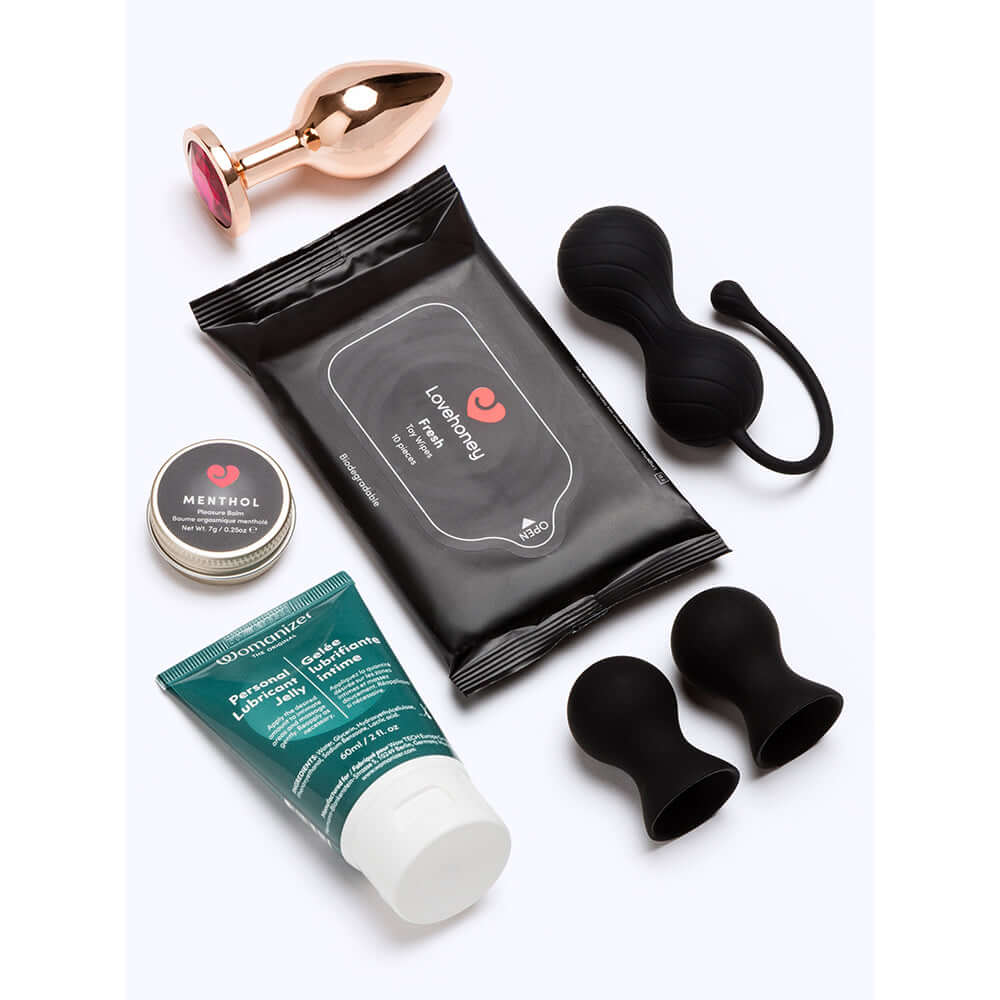 Lovehoney Indulge Advent Calendar 2026 (12 Day) assortment of intimate products and accessories.