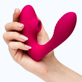 Lovehoney Indulge Advent Calendar 2026 (12 Day) vibrant pink toy held in hand against a light background.