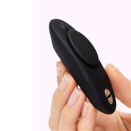 Close-up of a sleek black intimate toy, part of the Lovehoney X We-Vibe 7 Day Romance Advent Calendar.