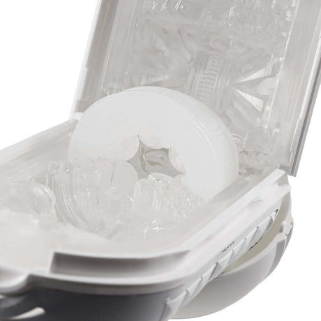 Tenga Flip Flexy Male Stroker opened to reveal malleable material and spiral-ribbed casing for dynamic pleasure.