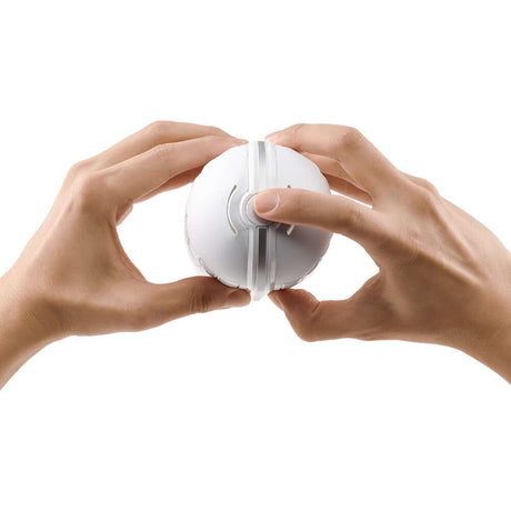Two hands holding the Tenga Flip Flexy Male Stroker, demonstrating its innovative flexible design.