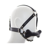 Ple'sur Face Harness Dog Bone Gag featuring a black harness and playful bone-shaped bit for pup play.