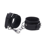 Sportsheets Signature Midnight Muse Handcuffs made of soft silicone with silver hardware for refined bondage play.