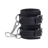 Sportsheets Signature Midnight Muse Handcuffs featuring soft silicone material and sleek silver hardware for refined restraint play.