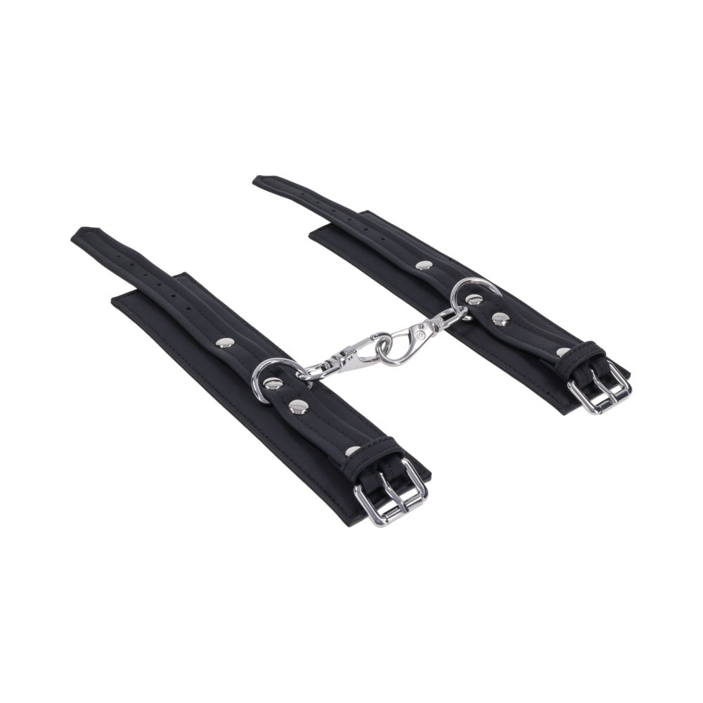 Sportsheets Signature Midnight Muse Handcuffs with soft silicone and sleek silver hardware for refined restraint play.