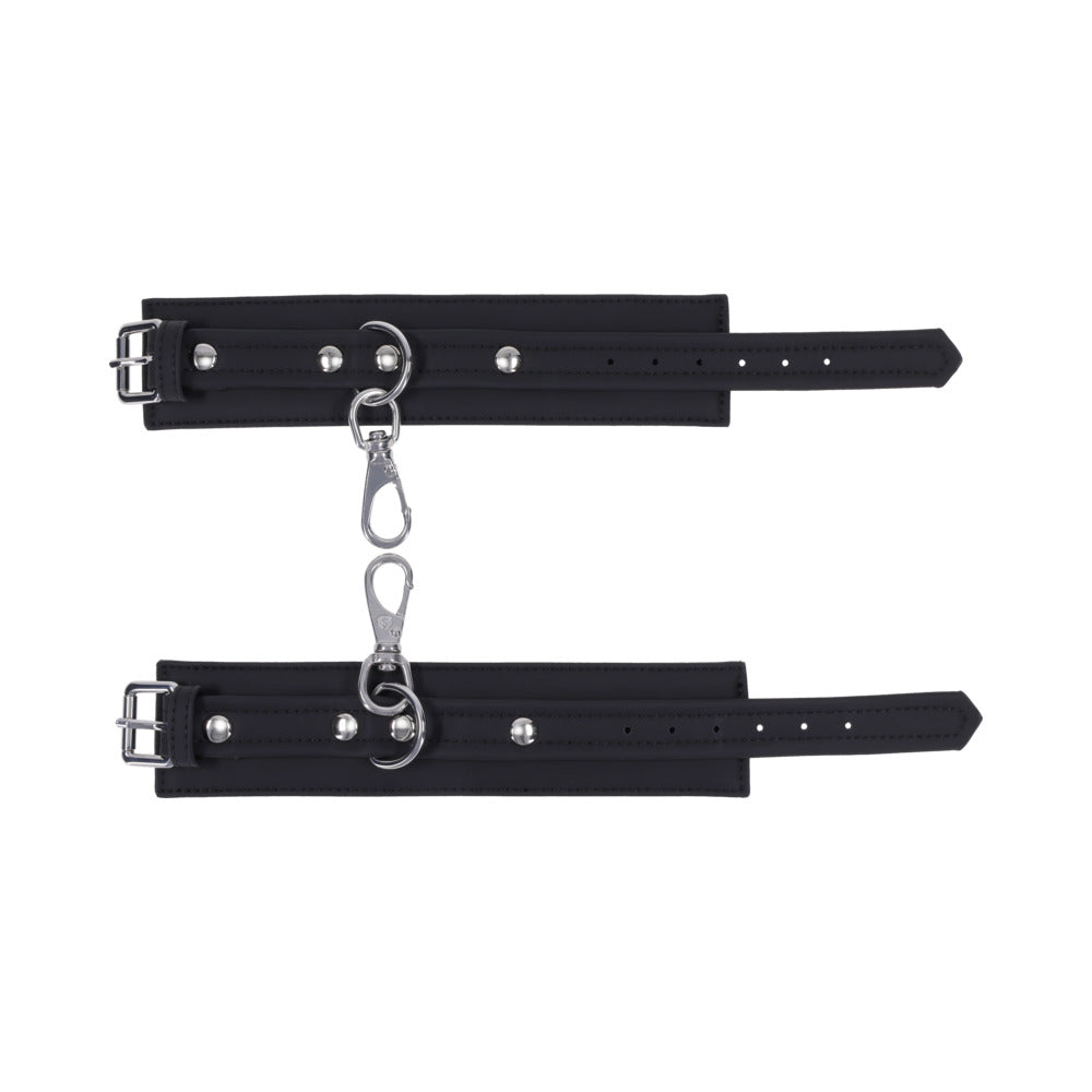 Sportsheets Signature Midnight Muse Handcuffs with soft silicone and silver hardware for refined restraint play.