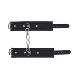 Sportsheets Signature Midnight Muse Handcuffs with soft silicone and silver hardware for refined restraint play.
