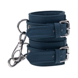Sportsheets Signature Twilight Tease Handcuffs in blue silicone with silver hardware for stylish restraint.