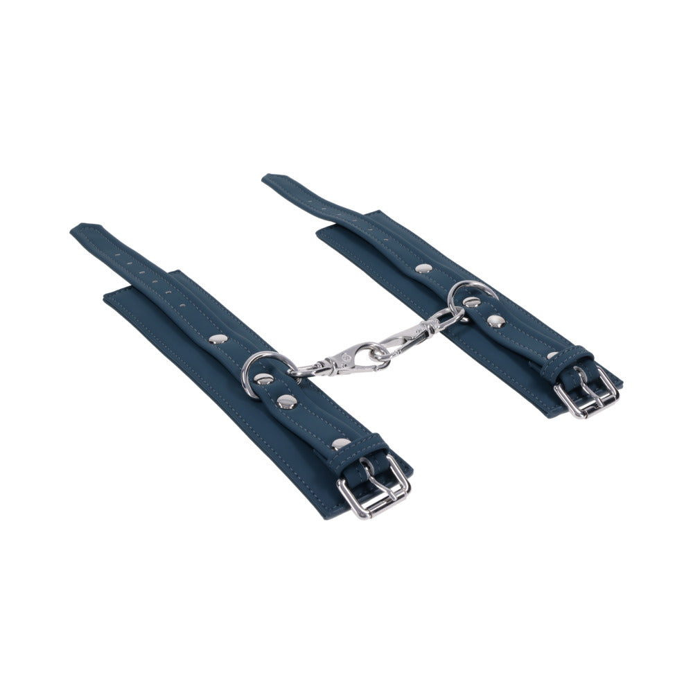 Sportsheets Signature Twilight Tease Handcuffs featuring sleek blue straps and silver hardware for stylish restraint.