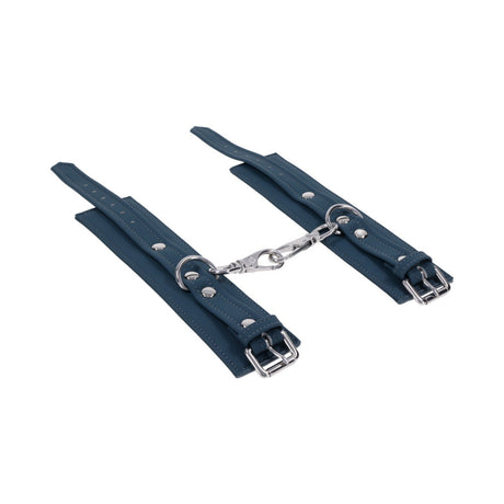 Sportsheets Signature Twilight Tease Handcuffs featuring sleek blue straps and silver hardware for stylish restraint.