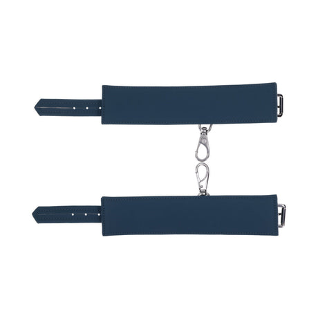 Sportsheets Signature Twilight Tease Handcuffs featuring soft silicone and sleek silver hardware.