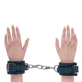 Sportsheets Signature Twilight Tease Handcuffs with sleek design and silver hardware, showcasing comfort and style.