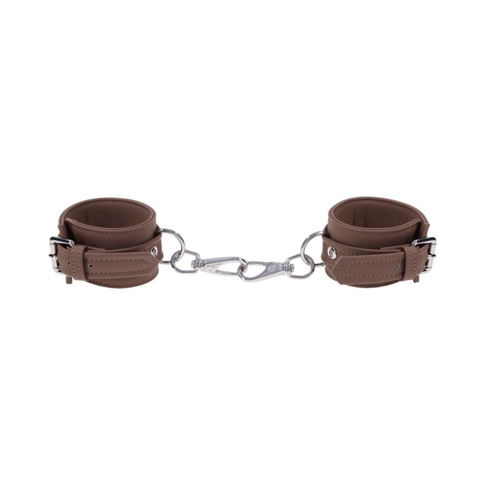 Sportsheets Signature Dawn Dream Handcuffs in soft silicone with silver hardware for restraint play.