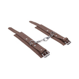 Sportsheets Signature Dawn Dream Handcuffs in soft silicone with silver hardware for stylish restraint play.