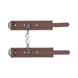 Sportsheets Signature Dawn Dream Handcuffs featuring soft silicone and sleek silver hardware for comfortable restraint play.