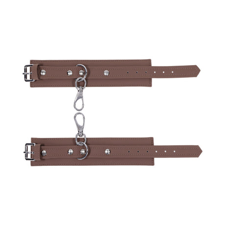 Sportsheets Signature Dawn Dream Handcuffs featuring soft silicone and sleek silver hardware for comfortable restraint play.