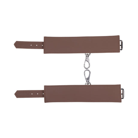 Sportsheets Signature Dawn Dream Handcuffs featuring soft silicone with silver hardware for comfortable restraint play.