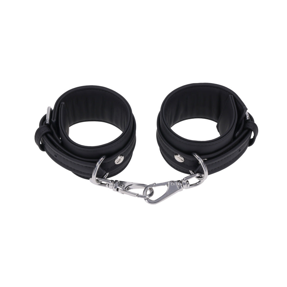 Sportsheets Signature Midnight Muse Ankle Cuffs featuring soft silicone and sleek silver-tone hardware for stylish restraint play.