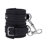 Sportsheets Signature Midnight Muse Ankle Cuffs featuring sleek black silicone and silver-tone hardware.