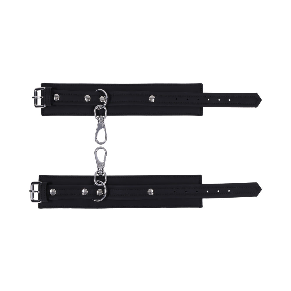 Sportsheets Signature Midnight Muse Ankle Cuffs featuring sleek black silicone and silver-tone hardware.