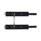 Sportsheets Signature Midnight Muse Ankle Cuffs featuring sleek black silicone and silver-tone hardware.