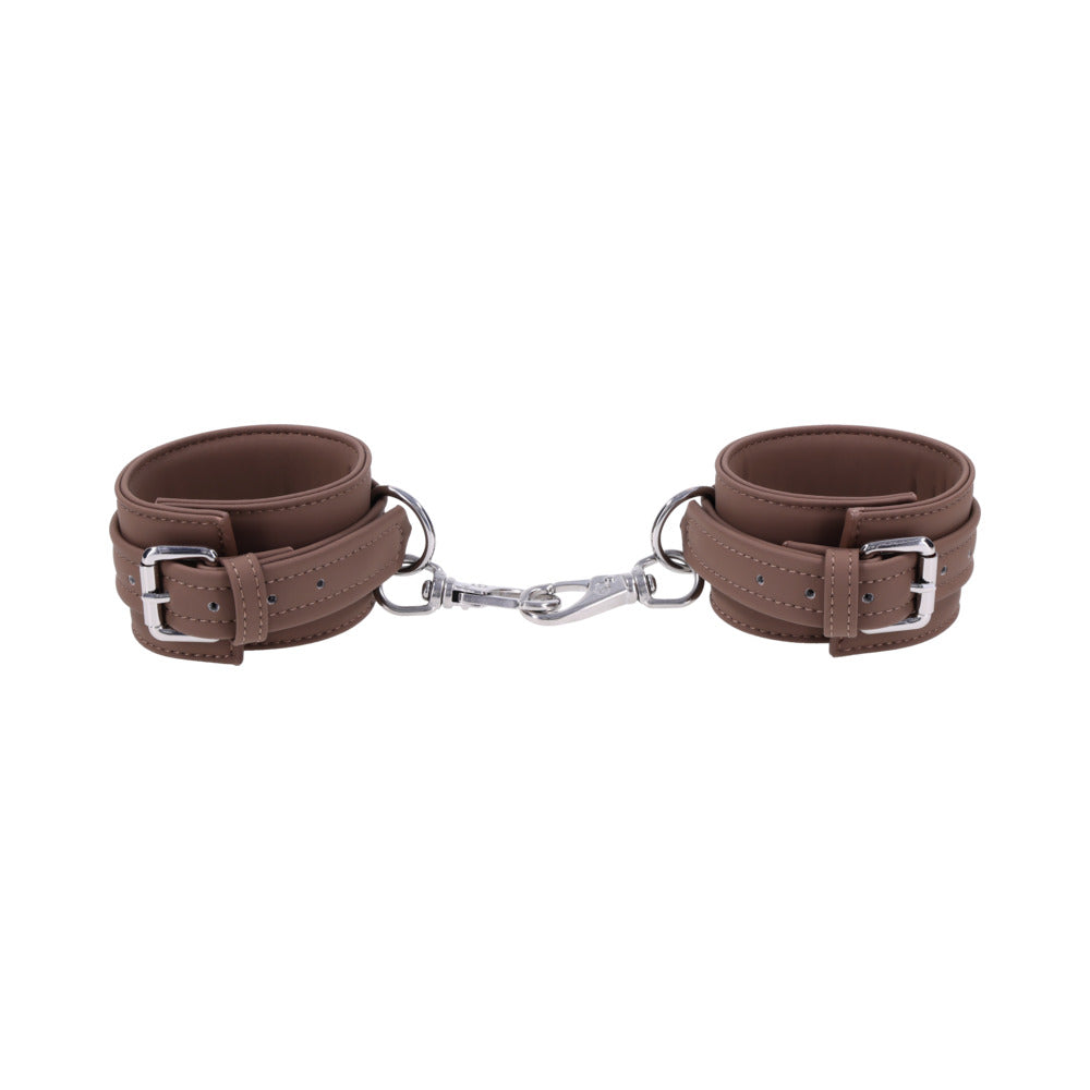 Sportsheets Signature Dawn Dream Ankle Cuffs in brown silicone with silver hardware for comfortable restraint play.