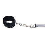 Sportsheets Signature Adjustable Spreader Bar with black cuff and metal clasps for versatile restraint.