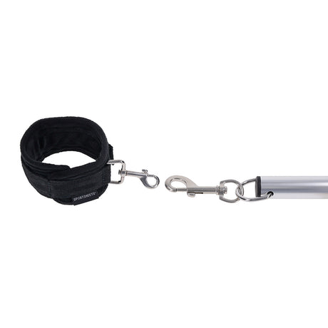 Sportsheets Signature Adjustable Spreader Bar with black cuff and metal clasps for versatile restraint.