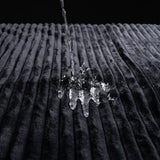 Water splashing on the plush texture of the Sportsheets Signature Waterproof Blanket.