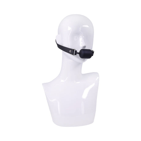 Sportsheets Signature Midnight Muse Barrel Gag on a mannequin head, showcasing its sleek design and luxurious look.