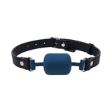 Sportsheets Signature Twilight Tease Barrel Gag with a blue mouthpiece and adjustable black strap.