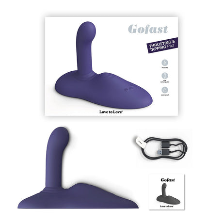 Love To Love Gofast Thrusting Vibrator Midnight Indigo with charging cable and packaging.