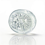 Clear interior view of the Sexflesh Palm-Tec LX Vol 20 Stroker Clear, showcasing its ribbed and nubbed design.