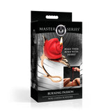 Burning Passion Rose Candle with Holder displayed in elegant packaging featuring a red rose candle and gold holder.