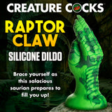 Raptor Claw Fisting Silicone Dildo Green in bold green color, featuring scaled texture and long claws for adventurous play.
