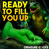 Raptor Claw Fisting Silicone Dildo Green in a vibrant green color, showcasing textured claws for adventurous play.