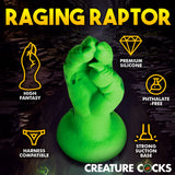 Raptor Claw Fisting Silicone Dildo Green showcasing vibrant green silicone, claw details, and strong suction base for adventurous play.