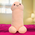 Happy Peckers Penis Pillow Small, a soft novelty pillow with a smiling face, perfect for playful decor.