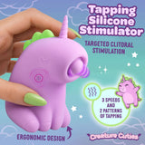 Tappyhorn Tapping Silicone Clitoral Stimulator in pastel pink with ergonomic design for targeted clitoral stimulation.