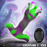 Creature Cocks Alien Bloom Expanding Silicone Anal Plug viewed in a fantasy setting with control remote.