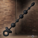 Master Series Balls Deep Vibrating Silicone Anal Beads in black silicone with graduated design and retrieval ring.