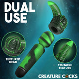 Octo Wand Silicone Vibrating Wand With Attachment showcasing dual-use textured head and tentacle attachment.