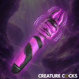 Creature Cocks Tenta Wand Silicone Vibrating Wand Purple featuring textured tentacle attachment and dual suction prongs.
