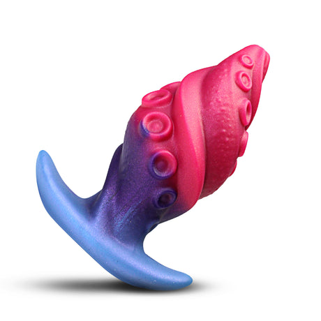 Creature Cocks Tenta Plug Silicone Butt Plug in pink and blue color with tentacle design and suction studs.