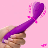 Flexible Silicone G-Spot Vibrator Purple held in hand with a flexible design for enhanced pleasure.